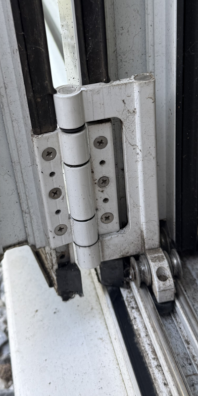 Debar bifolding door roller hinge